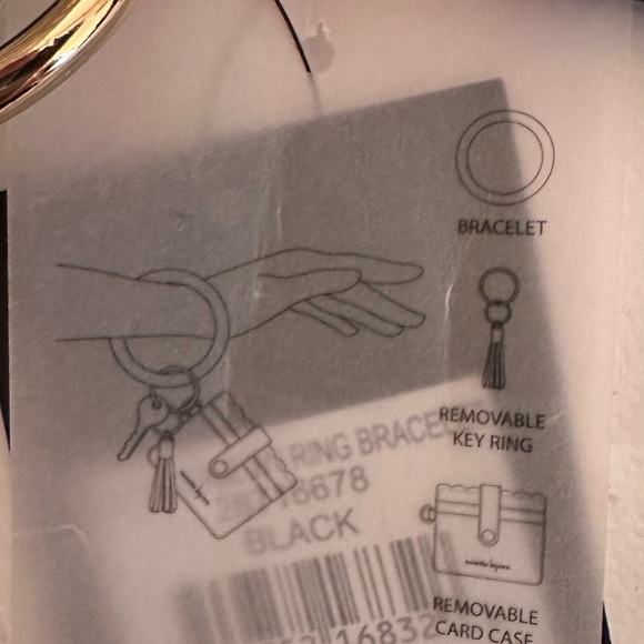 Black bracelet with a gold o- ring for car keys and credit card holder. - Picture 6 of 6